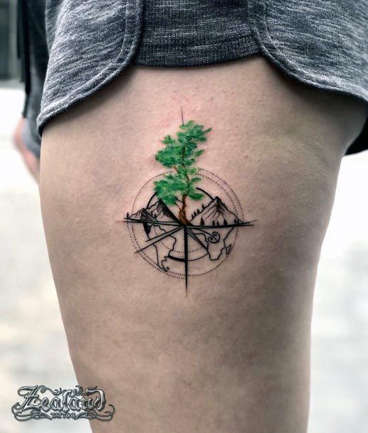 Compass And Green Tree Tattoo Womens Thighs
