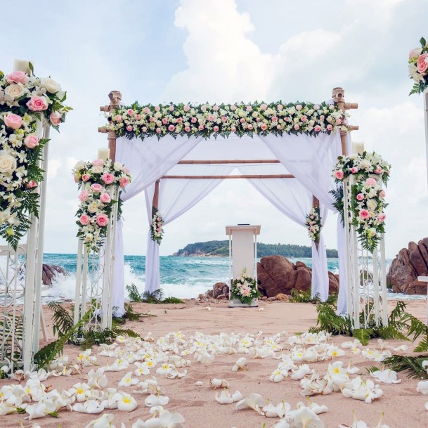 Cool Beach White Draped Canopy With Light Florals Wedding Arch Ideas