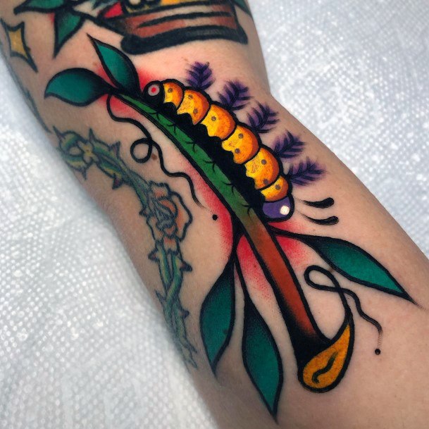 Cool Female Caterpillar Tattoo Designs