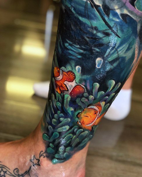 Cool Female Clown Fish Tattoo Designs