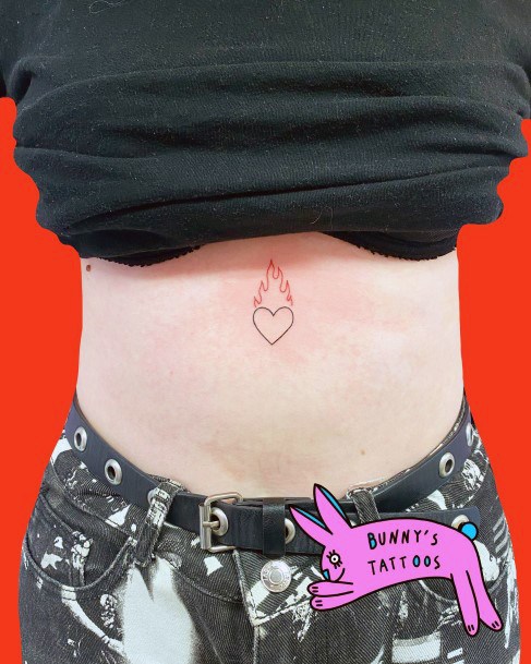 Cool Female Flaming Heart Tattoo Designs