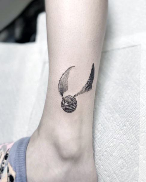 Cool Female Golden Snitch Tattoo Designs