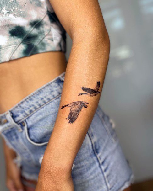 Cool Female Goose Tattoo Designs