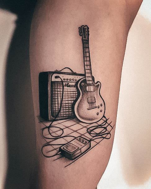 Cool Female Guitar Tattoo Designs With Amp And Foot Pedal