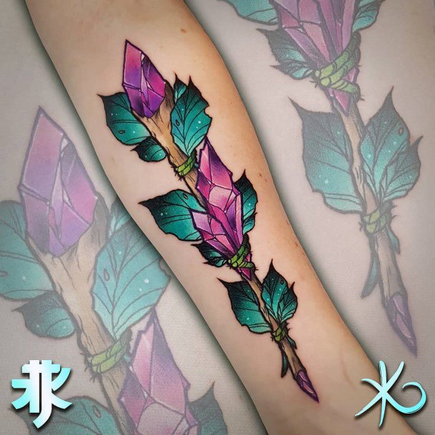 Cool Female Magic Tattoo Designs