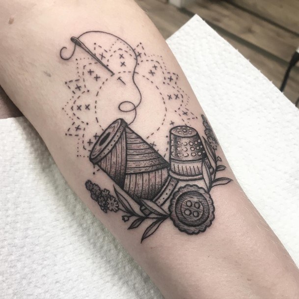 Cool Female Needle And Thread Tattoo Designs