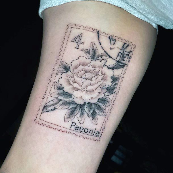 Cool Female Postage Stamp Tattoo Designs