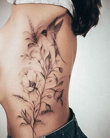 Cool Female Rib Tattoo Designs Bird Flower