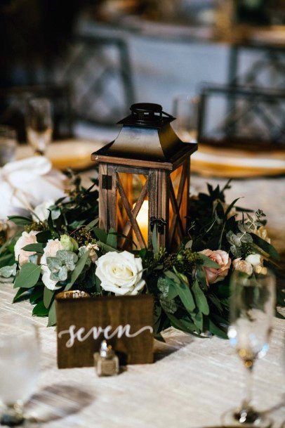 Cool Rustic Candle Lantern Greenery Lush White Floral Table Decorations For Wedding