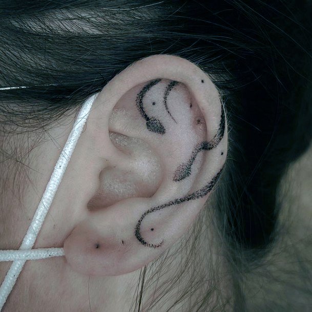 Coolest Females Ear Tattoo