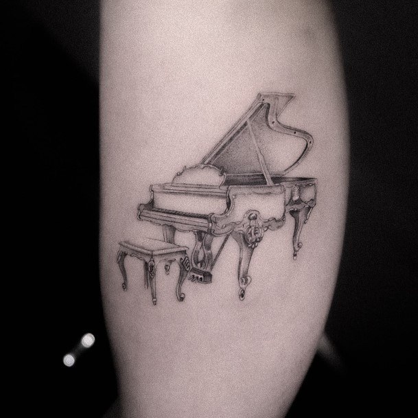 Coolest Womens Piano Tattoos