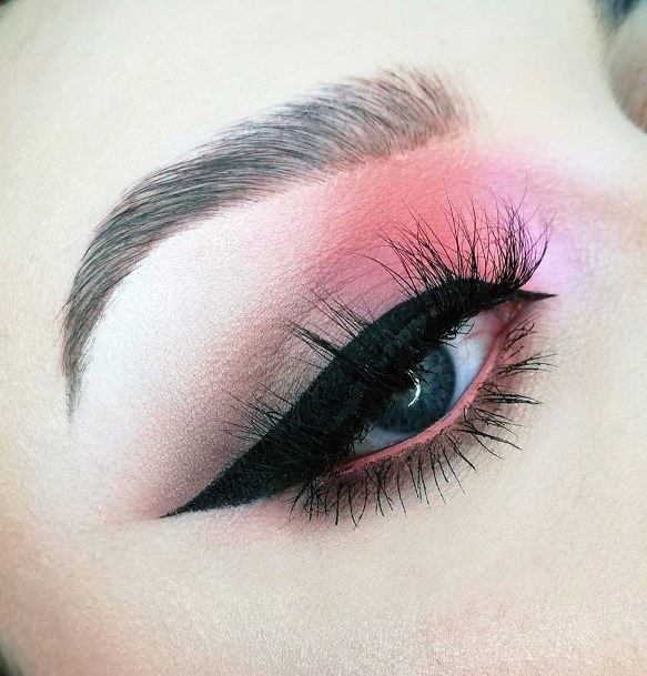 Coral Eyeshadow With Think Black Eyeliner Details Women