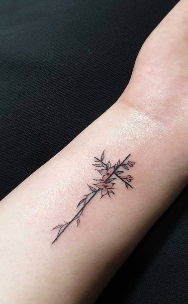 Coral Flowers And Cross Tattoo On Wrists