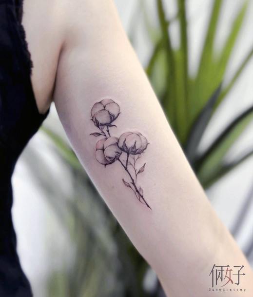 Cotton flower tattoo on the ankle