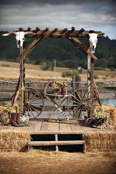 Country Wedding Ideas Bull Skulls And Spoke Wheel Arch Inspiration