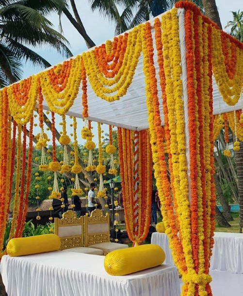 Couple Couch Decorated With Marigold Flowers Indian Wedding