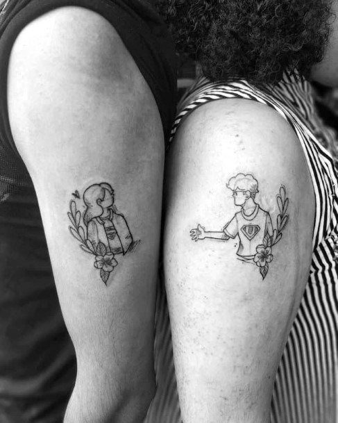 Couples Charming Tattoo On Arms