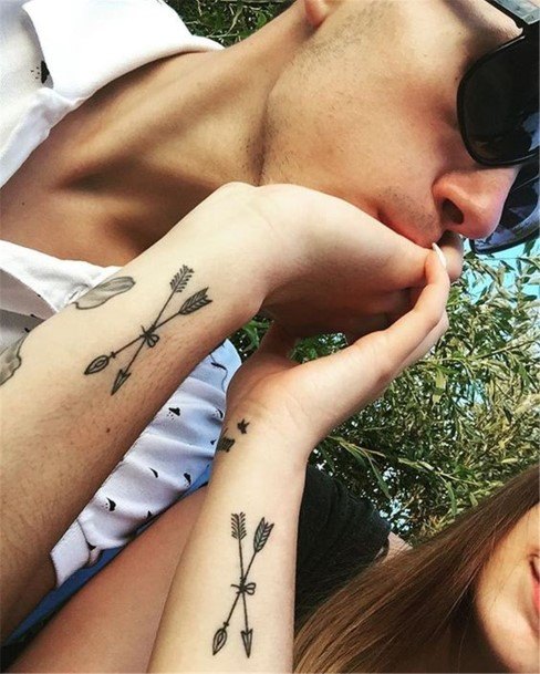 Couples Crossed Over Bow Tattoo Wrists