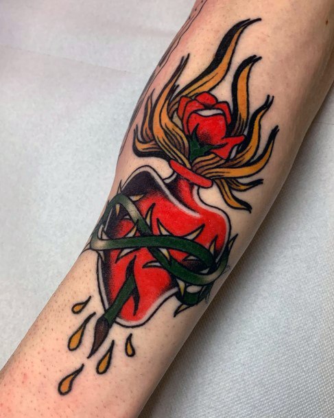 Creative Flaming Heart Tattoo Designs For Women