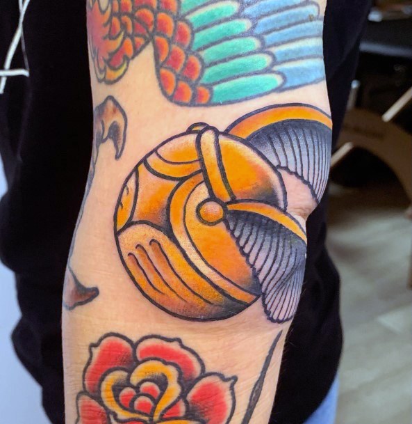 Creative Golden Snitch Tattoo Designs For Women