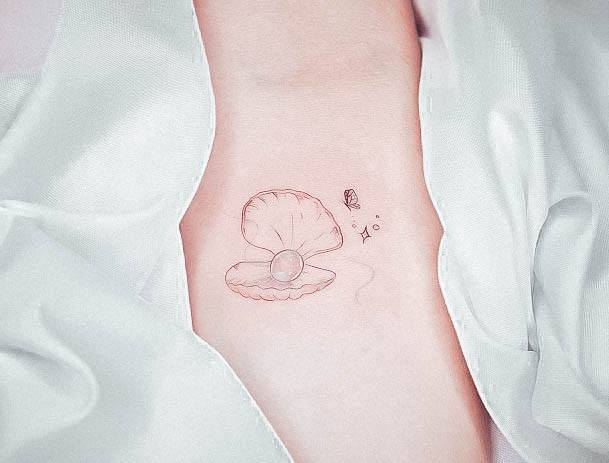 Creative Pearl Tattoo Designs For Women