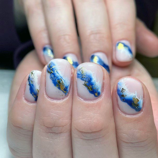 Creative Smudge Of Blue And Gold On White Nails