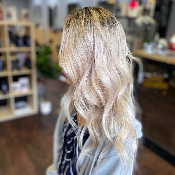 Cute And Fun Warm Blonde Highlights In Long Curled Hairstyle For Girls