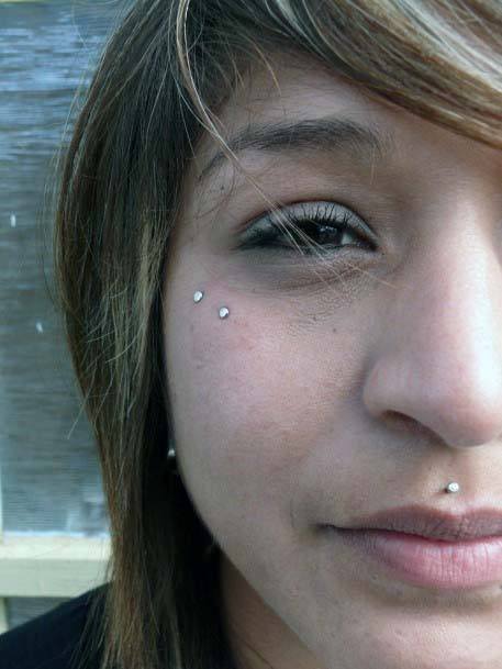 Cute And Sassy Double Dermal Facial Piercing Design Ideas For Girls