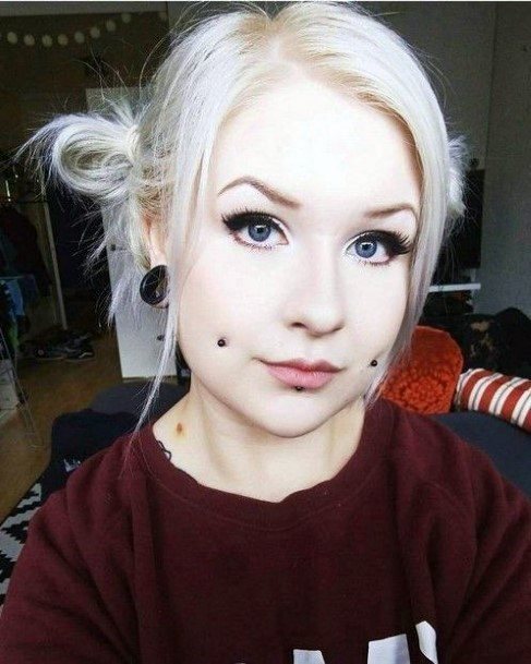 Cute Appealing Cheek And Labret Face Piercings For Girls