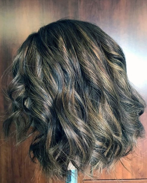 Cute Caramel Highlights For Brunettes In Beautiful Bouncy Curled Hairstyle