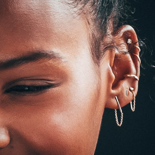 Cute Dangling Gold Hoop Ear Piercing Inspiration For Women