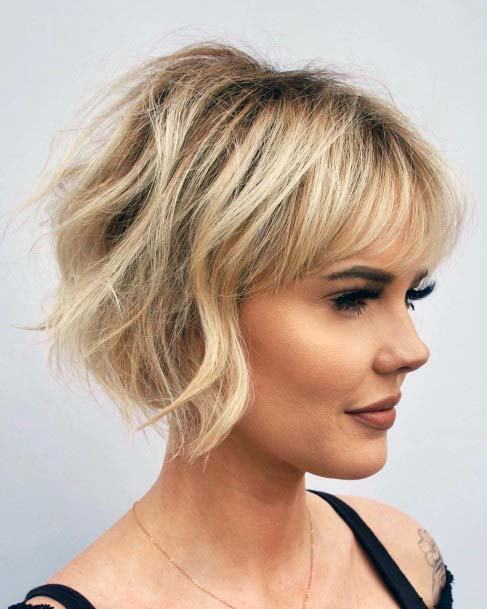 Cute Dark Rooted Multi Shade Blonde Highlighted Shag Womens Hairstyle