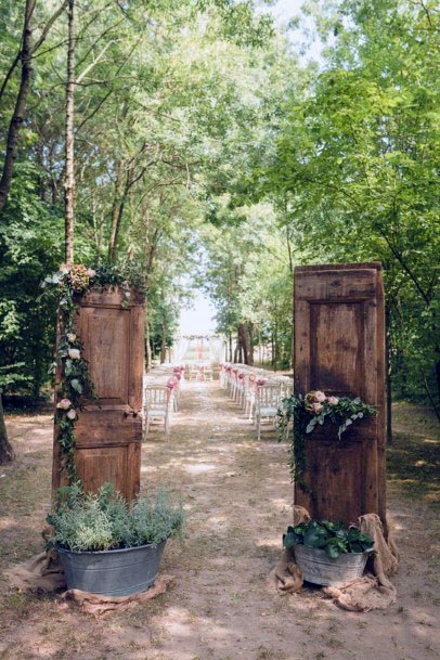 Cute Double Door Aisle Entery Greenery Outdoor Wedding Ideas