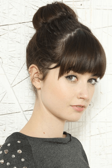 Cute Fringe With Bun Hairstyles For Women With Dark Brown Hair