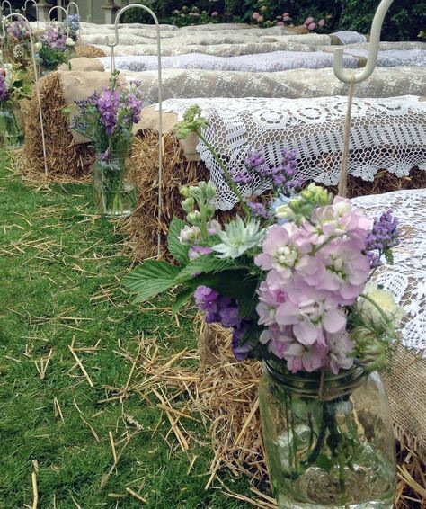 Cute Lace Over Hay Ceremony Seats With Purple Florals Country Wedding Ideas