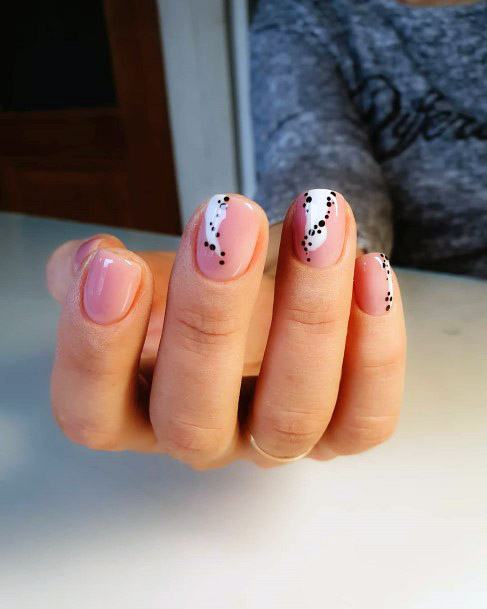 Cute Pink Nails With White Design And Black Dots