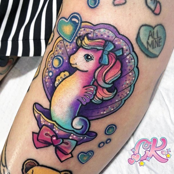 Cute Purple Shaded Unicorn With Shell Women Tattoo