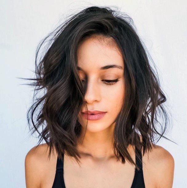 Cute Shoulder Length Hair With Large Waves And Side Part