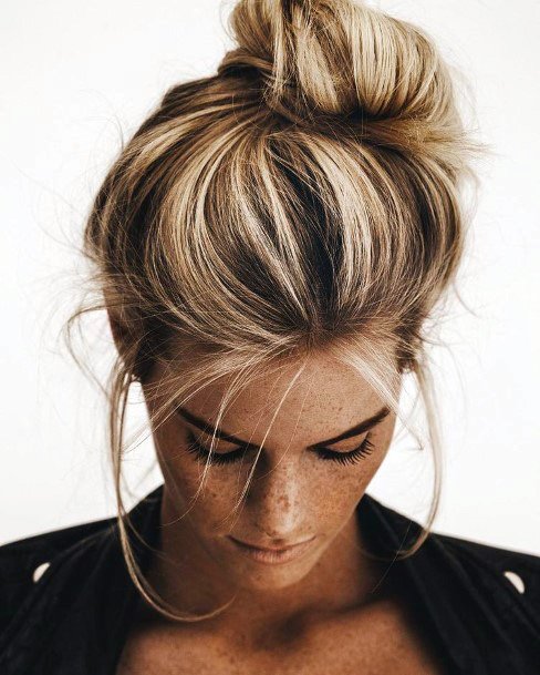 Cute Woman With Dirt Blonde Hair In Top Knot Hairstyle