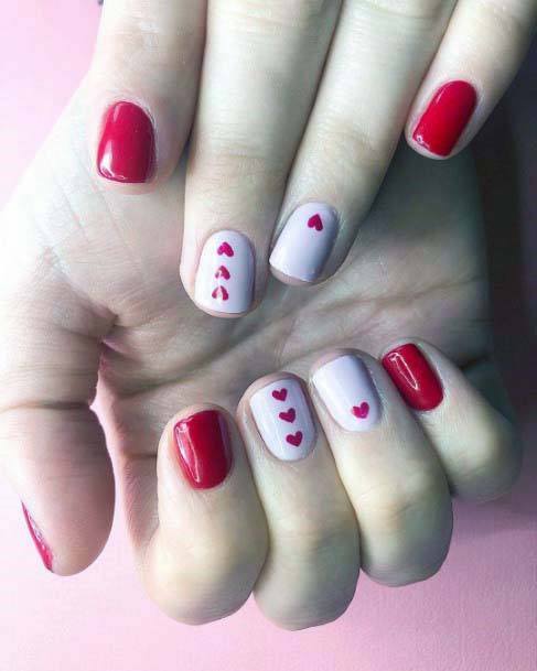 Dainty Nails With Pink And Red Hearts Designs For Women