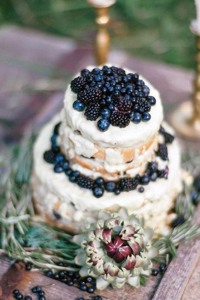 Dark Blue Berries On Rustic Wedding Cake