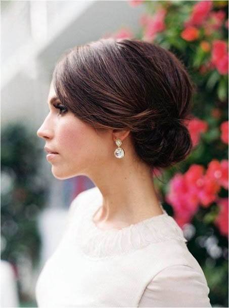 Dark Brown Hair With Slick Low Bun On Female