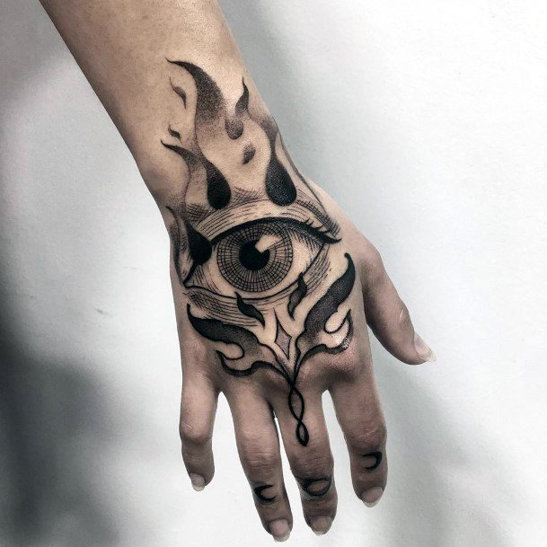 Dark Flaming Eyes Tattoo Womens Hands