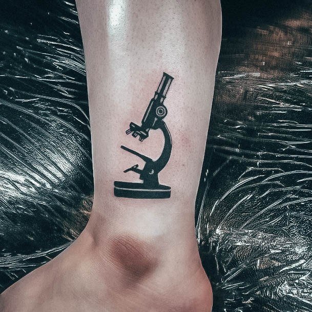 Dark Inner Ankle Magnificent Microscope Tattoo For Girls