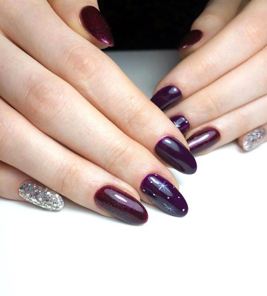 Dark Purple Colored Almond Nails