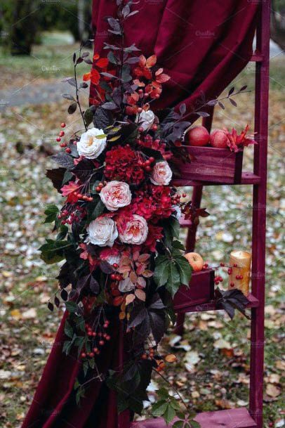 Dark Red Wedding Flowers And Fabric