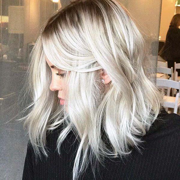 Dark Rooted Angled White Platinum Blonde Textured Bob Womens Hairstyle