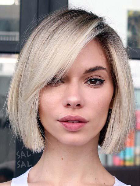 Dark Rooted Ashy Blonde Side Parted Sleek Straight Womens Hairstyle