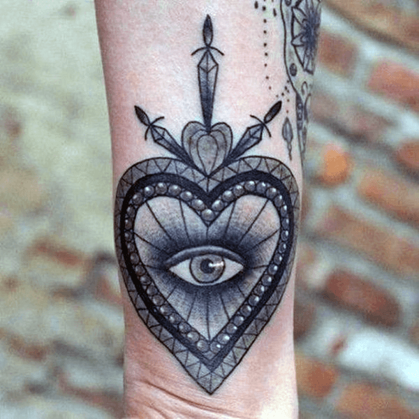 Decorated Heart And Eye Tattoo Womens Arms