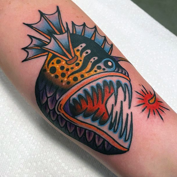 Decorative Anglerfish Tattoo On Female